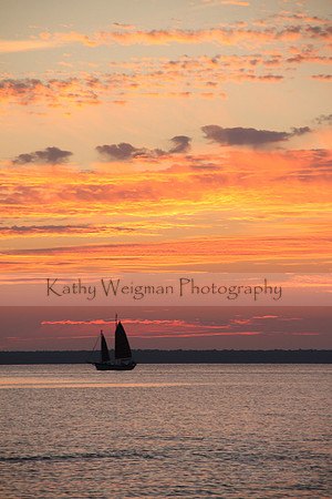 Orange Layered Sunset with Boat