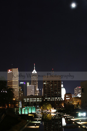 Skyline at Night with Full Moon